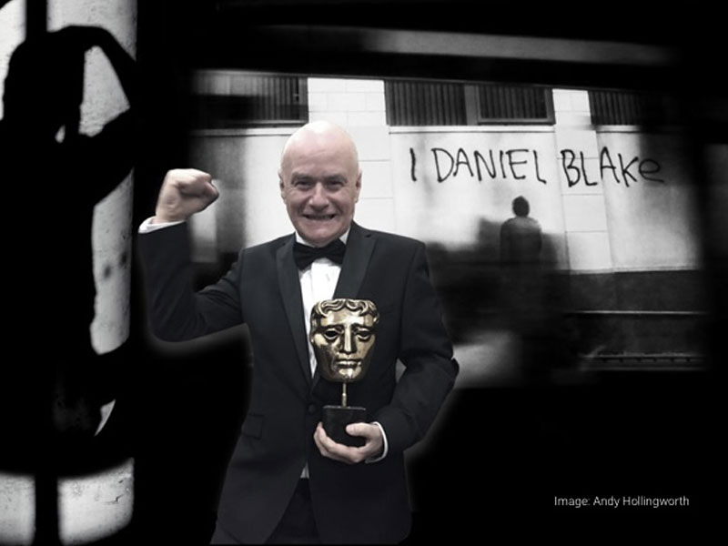 Dave Johns holding BAFTA award for 'I Daniel Blake'